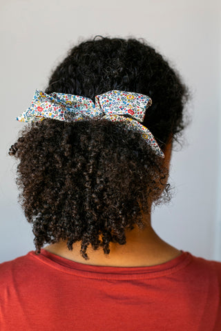 floral hair scarf on curly hair ponytail