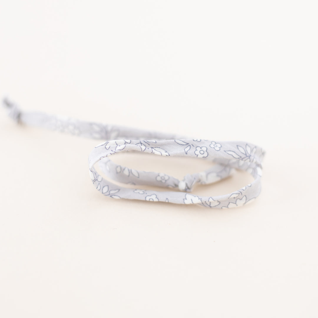 Caraclarkdesign floral laces for baby shoes. handcrafted by black-owned baby brand