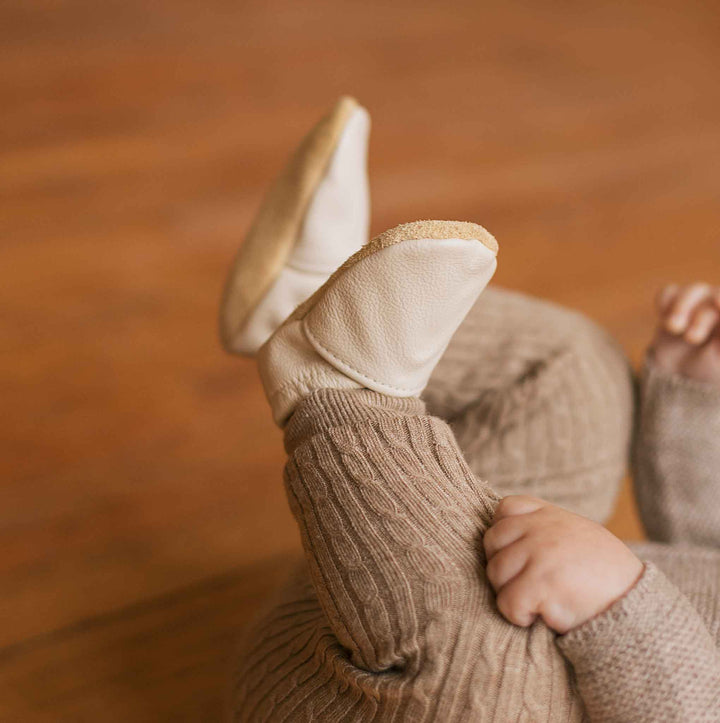 off white gender neural slip on moccs. Great for baptisms, christenings and gender neutral baby gifts.