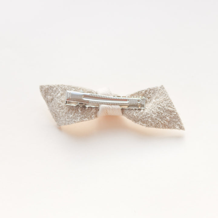 Knotted bow barrette